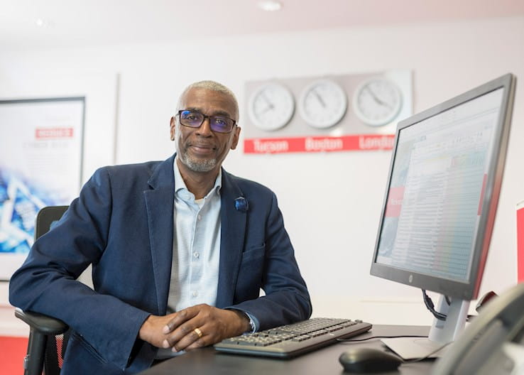 Person sitting on desk